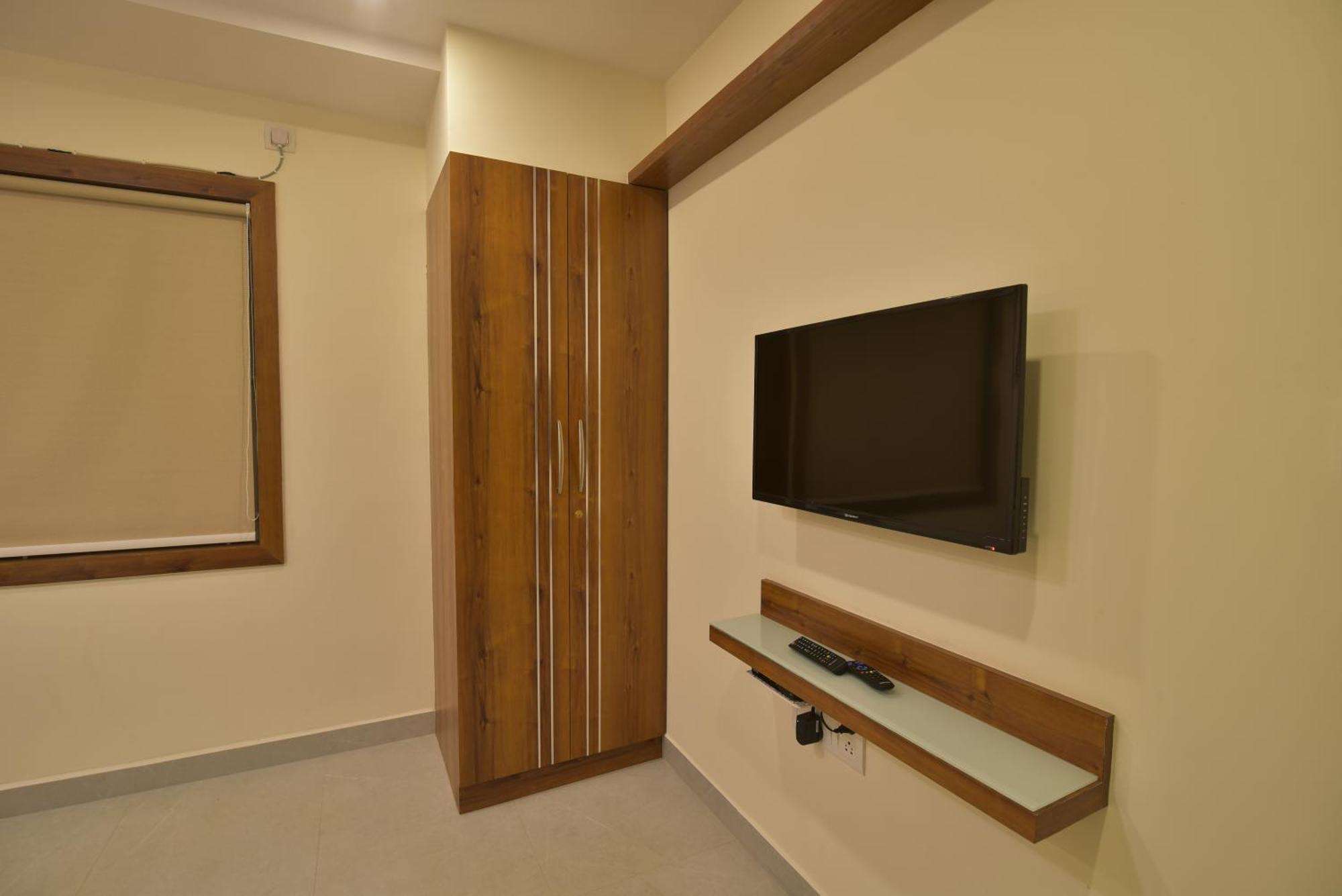 Address 24 Inn Бангалор Экстерьер фото